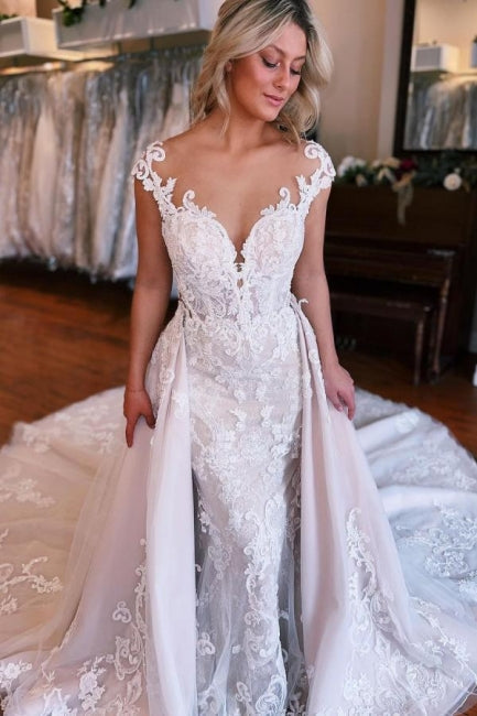 Vestidos de novia de tul con escote corazón, hombros descubiertos y encaje, estilo sirena.
