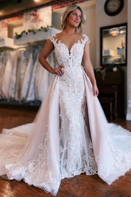Vestidos de novia de tul con escote corazón, hombros descubiertos y encaje, estilo sirena.