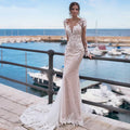 Robe de mariée sirène sexy dos nu à manches longues, broderies et applications de dentelle, idéale pour un mariage sur la plage ou une fête.
