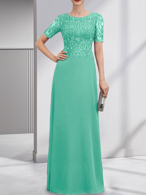 Vestido de novia de corte línea A, escote redondo, largo hasta el suelo, de encaje y gasa con lentejuelas.