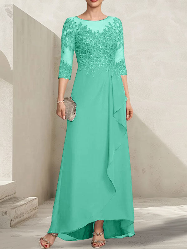 Vestido de madrina de la novia, corte asimétrico, escote ilusión, encaje y gasa, con lentejuelas y volantes en cascada.