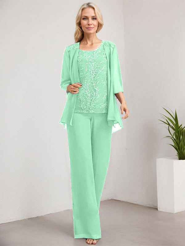 Vestido de novia de gasa con encaje y lentejuelas, estilo mono/pantalón, largo hasta el suelo, con escote redondo.