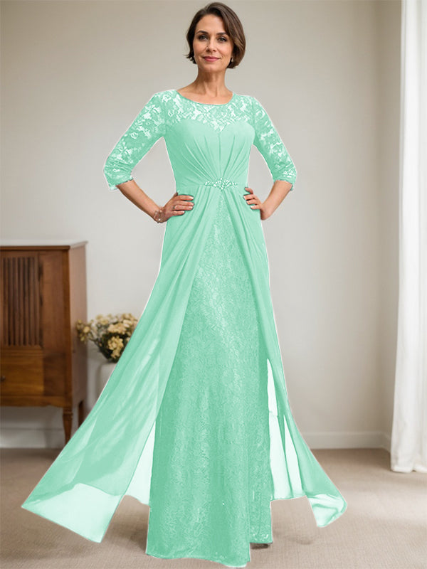 Vestido de novia de corte línea A, escote redondo ilusión, largo hasta el suelo, de gasa de encaje con volantes y pedrería. 