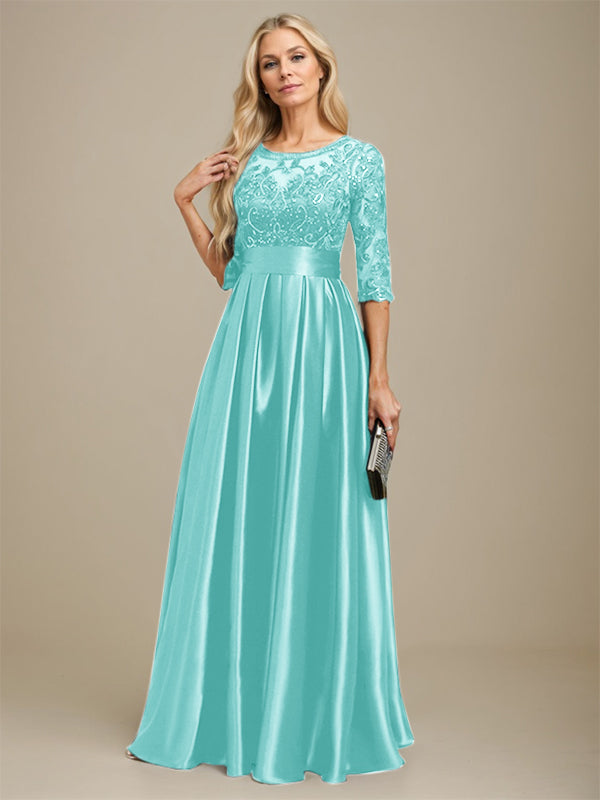 Robe de mariée longue en satin stretch dentelle et dentelle, coupe trapèze, décolleté illusion, ornée d'un nœud à sequins 