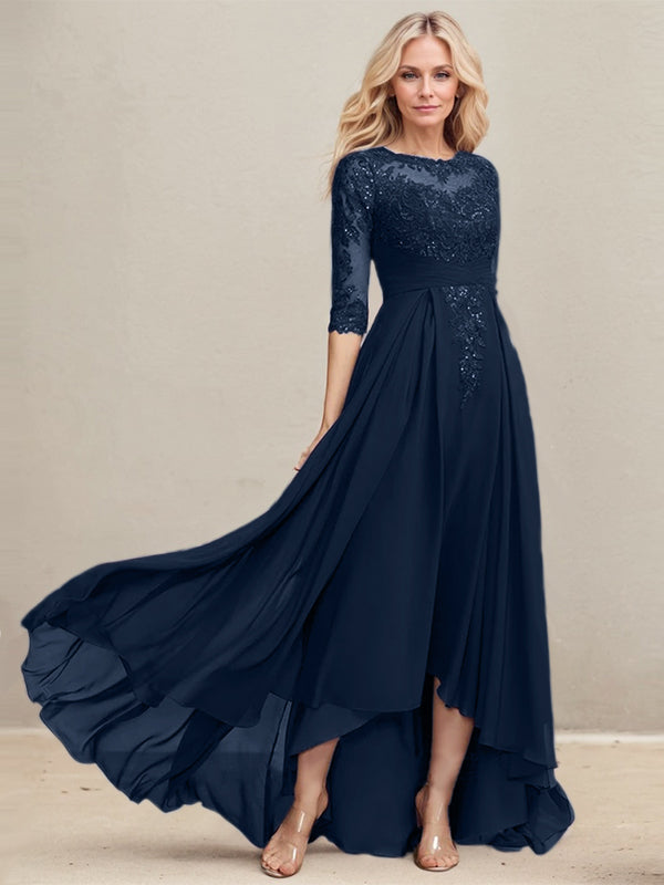Vestido de madrina de la novia, corte en A, escote redondo ilusión, asimétrico, de encaje y gasa con lentejuelas plisadas. 