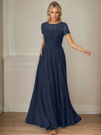 Robe en mousseline de soie bleu marine foncé, coupe trapèze, col bateau et sequins 
