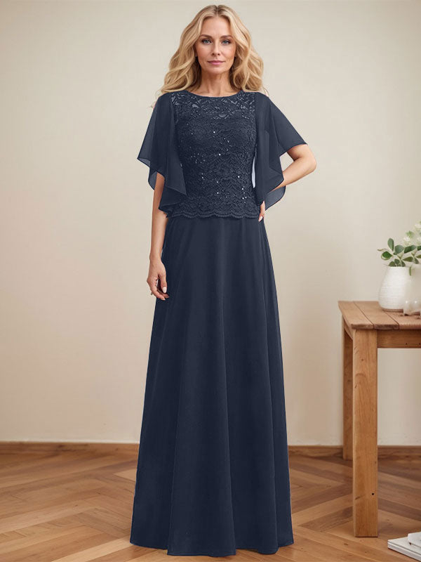 Vestido de novia de corte A, escote redondo, ilusión, largo hasta el suelo, de encaje y gasa con lentejuelas. 