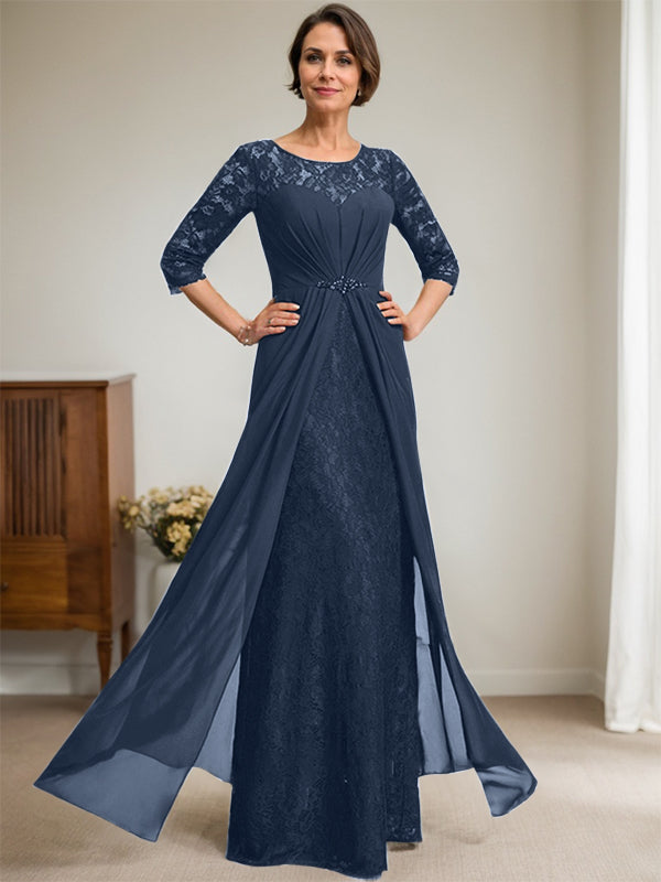 Vestido de novia de corte línea A, escote redondo ilusión, largo hasta el suelo, de gasa de encaje con volantes y pedrería. 