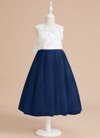 Vestido midi de encaje floral y lazo grande 