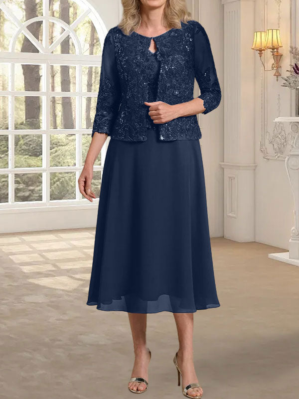 Vestido de novia de corte línea A, escote redondo, largo hasta la rodilla, de encaje y gasa con lentejuelas. 