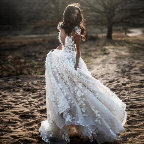 Vestidos de novia estilo boho romántico campestre con flores 3D, escote en V sexy y efecto ilusión, estilo árabe.