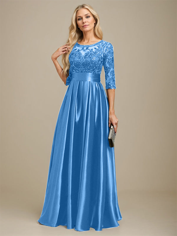 Robe de mariée longue en satin stretch dentelle et dentelle, coupe trapèze, décolleté illusion, ornée d'un nœud à sequins 