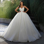 Vestido de novia clásico de princesa 2023, sin mangas, con exquisitos apliques, corte en A y hombros descubiertos. Diseño personalizado. 