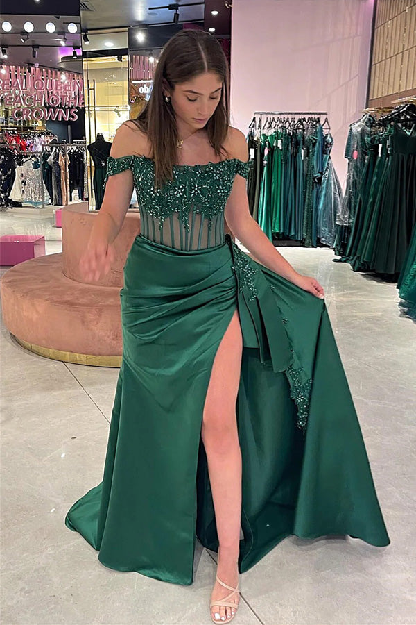 Vestido largo de fiesta estilo sirena con hombros descubiertos, estampado floral y abertura.