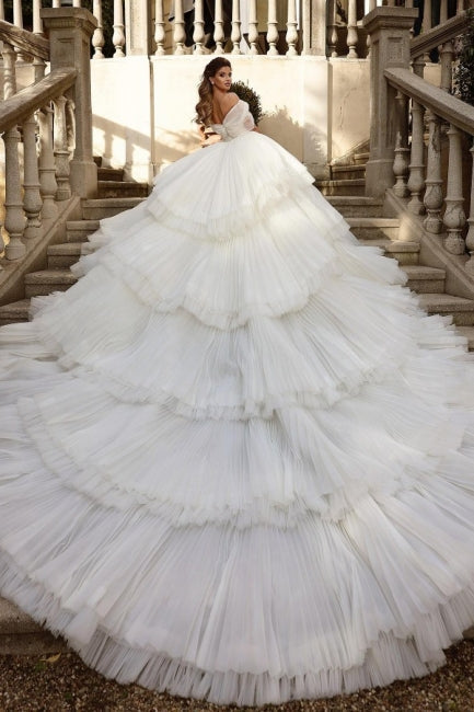 Robe de mariée luxueuse en tulle blanc à épaules dénudées et volants