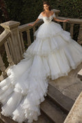 Robe de mariée luxueuse en tulle blanc à épaules dénudées et volants