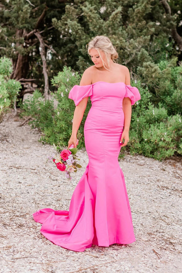 Vestido largo de fiesta rosa chicle estilo sirena, sin tirantes y con hombros descubiertos