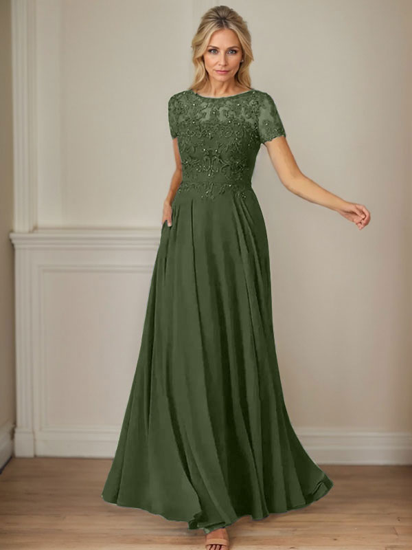Robe en mousseline de soie bleu marine foncé, coupe trapèze, col bateau et sequins 