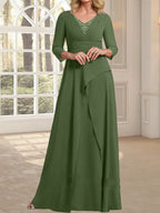 Vestido de gasa de corte A, escote en V, largo hasta el suelo, para la madre de la novia, con plisados ​​y cuentas.