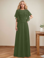 Vestido de novia de corte A, escote redondo, ilusión, largo hasta el suelo, de encaje y gasa con lentejuelas. 
