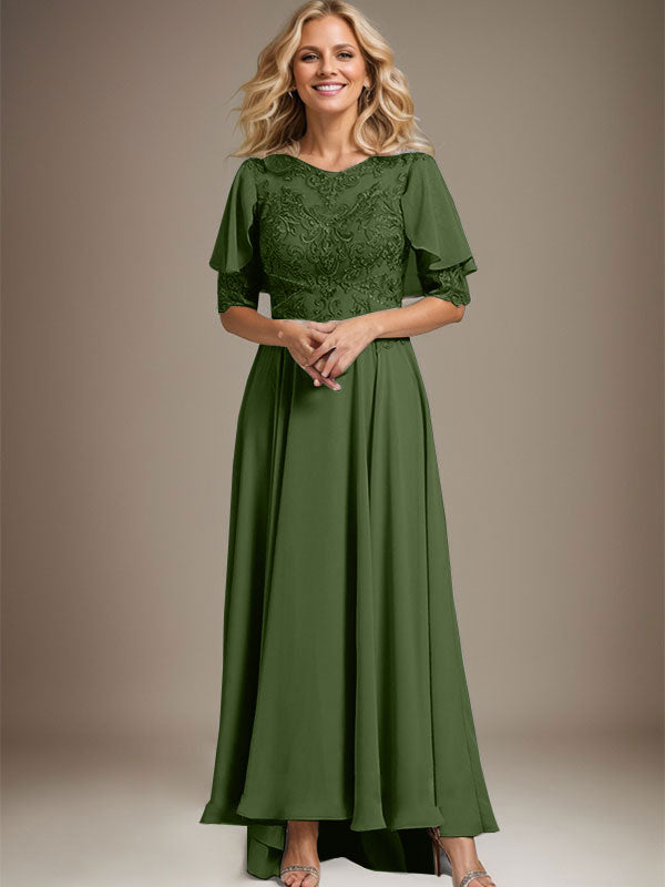 Vestido de novia asimétrico de gasa con encaje, corte en A, escote redondo y ilusión, con pedrería. 
