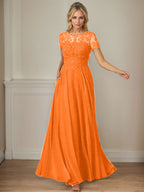 Robe en mousseline de soie bleu marine foncé, coupe trapèze, col bateau et sequins 