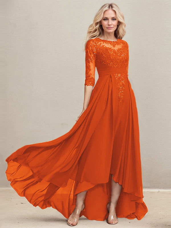 Vestido de madrina de la novia, corte en A, escote redondo ilusión, asimétrico, de encaje y gasa con lentejuelas plisadas. 