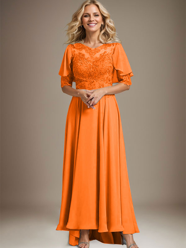 Vestido de novia asimétrico de gasa con encaje, corte en A, escote redondo y ilusión, con pedrería. 