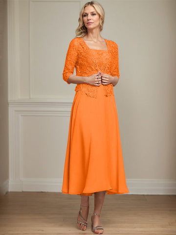 Vestido de corte A, largo midi, de gasa, encaje y lentejuelas para la madre de la novia. 