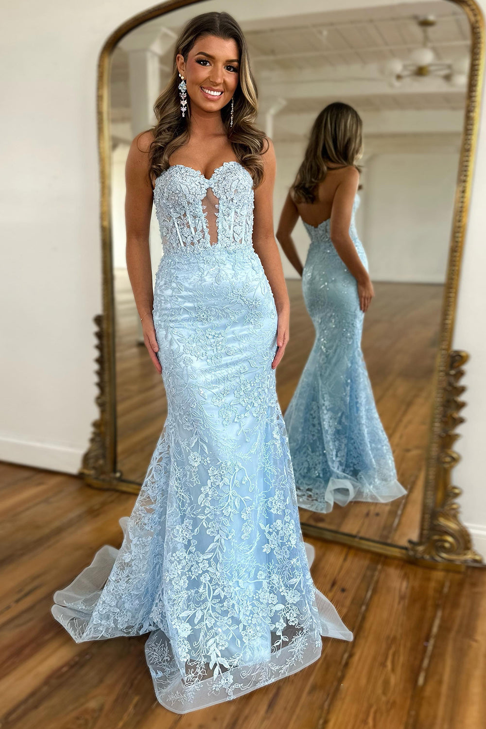 Robe de bal sirène longue corsetée à décolleté cœur et appliques