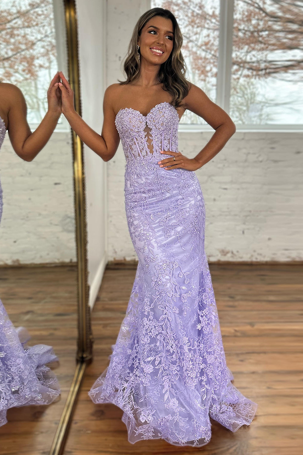 Robe de bal sirène longue corsetée à décolleté cœur et appliques