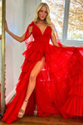 Robe de bal longue en tulle à volants, coupe trapèze, bretelles ajustables et fente.