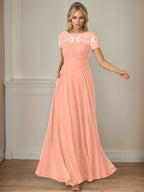 Robe en mousseline de soie bleu marine foncé, coupe trapèze, col bateau et sequins 