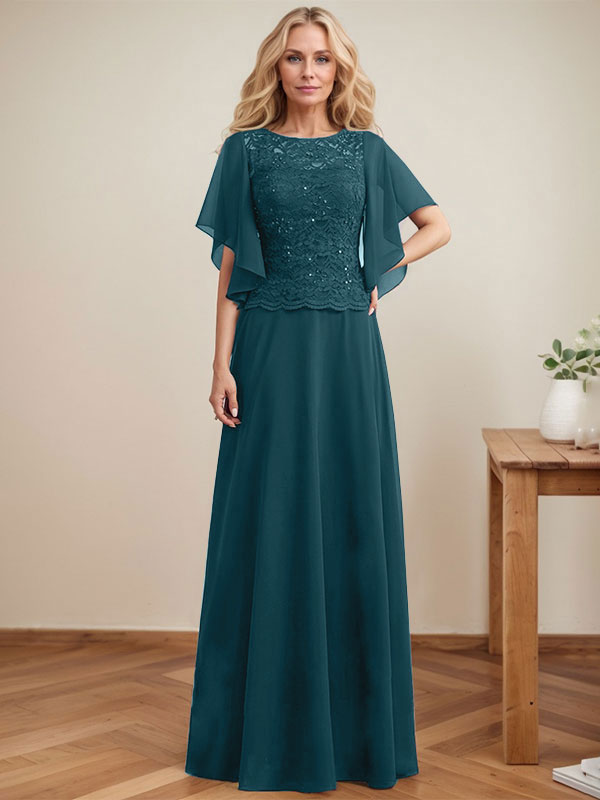 Vestido de novia de corte A, escote redondo, ilusión, largo hasta el suelo, de encaje y gasa con lentejuelas. 