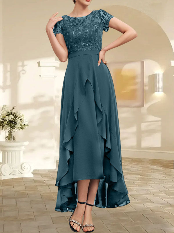 Robe de mère de la mariée asymétrique en mousseline de soie et dentelle, coupe trapèze, décolleté en V, effet illusion, nœud, volants et sequins 