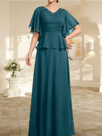 Vestido de gasa de corte A, escote en V, largo hasta el suelo, para la madre de la novia, con plisados ​​y cuentas.