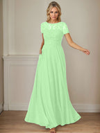 Robe en mousseline de soie bleu marine foncé, coupe trapèze, col bateau et sequins 