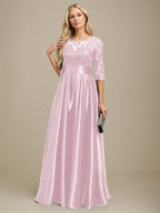 Robe de mariée longue en satin stretch dentelle et dentelle, coupe trapèze, décolleté illusion, ornée d'un nœud à sequins 