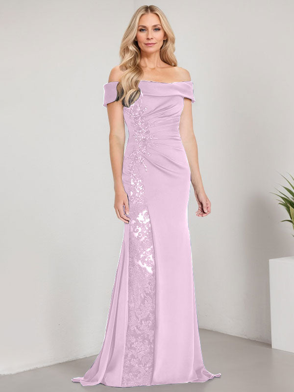 Vestido de corte sirena para la madre de la novia, largo hasta el suelo, con hombros descubiertos, apliques y pedrería, con abertura alta. 