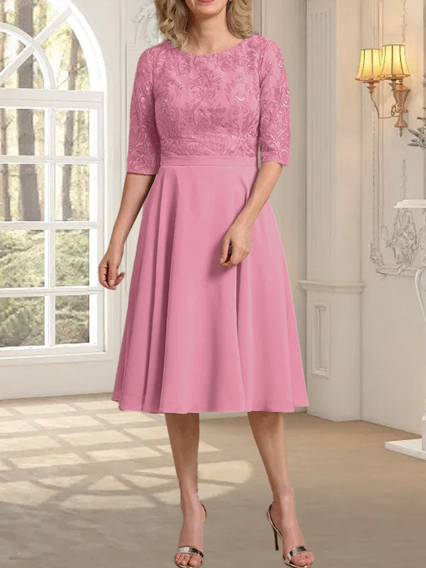 Vestido de novia de gasa de encaje, corte en A, escote redondo y largo hasta la rodilla.