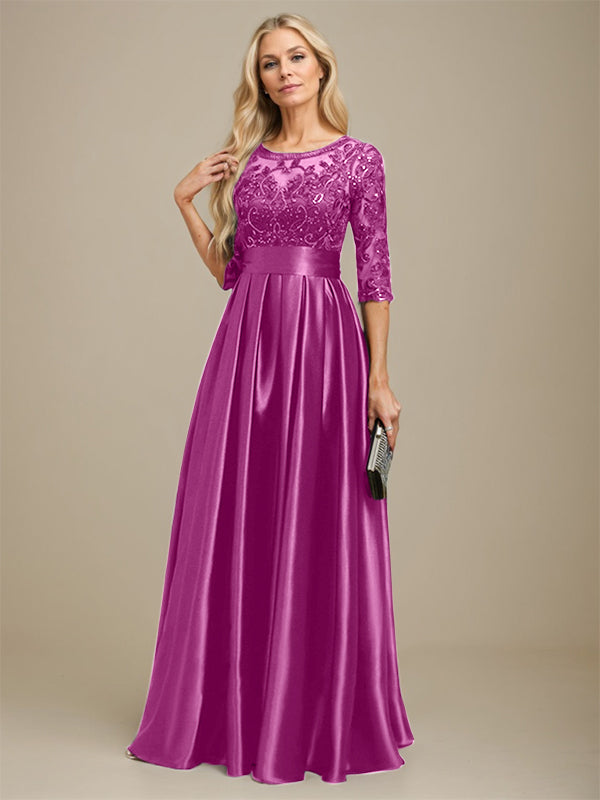 Vestido de madrina de la novia, corte en A, escote ilusión, largo hasta el suelo, satén elástico con encaje y lazo de lentejuelas. 