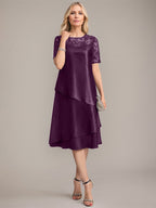 Vestido de corte A, escote redondo, largo hasta la rodilla, para la madre de la novia, con apliques y lentejuelas. 