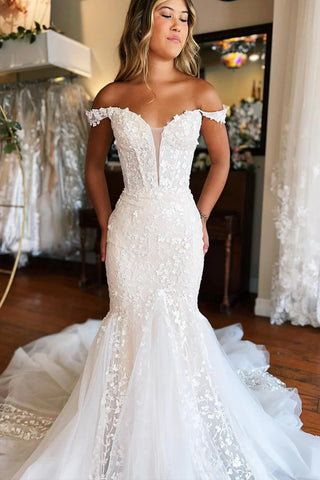 Vestido de novia corte sirena color marfil con escote pronunciado y hombros descubiertos WD708