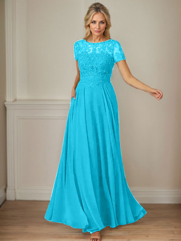 Robe en mousseline de soie bleu marine foncé, coupe trapèze, col bateau et sequins 