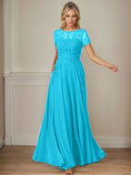 Robe en mousseline de soie bleu marine foncé, coupe trapèze, col bateau et sequins 