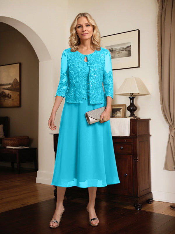 Vestido de novia de corte línea A, escote redondo, largo hasta la rodilla, de encaje y gasa con lentejuelas. 