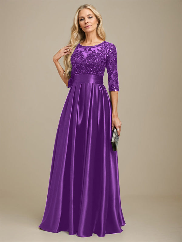 Vestido de madrina de la novia, corte en A, escote ilusión, largo hasta el suelo, satén elástico con encaje y lazo de lentejuelas. 