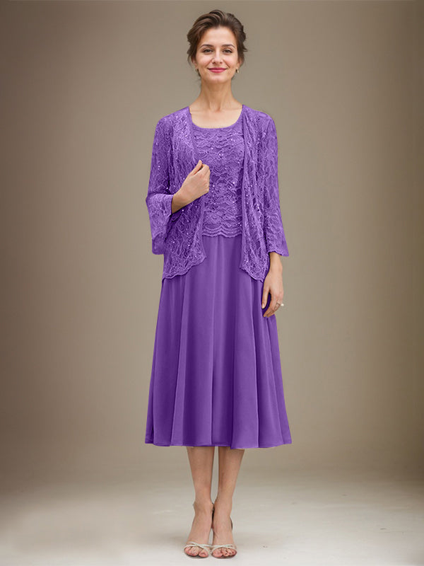 Vestido de novia de corte línea A, escote redondo, largo hasta la rodilla, de encaje y gasa con lentejuelas. 