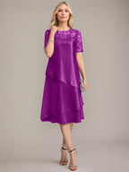Vestido de corte A, escote redondo, largo hasta la rodilla, para la madre de la novia, con apliques y lentejuelas. 