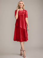 Vestido de corte A, escote redondo, largo hasta la rodilla, para la madre de la novia, con apliques y lentejuelas. 